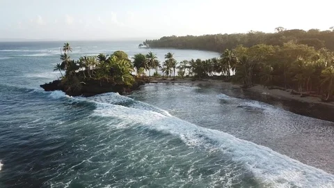 Fly around Island surrounded by ocean, Lines of Pure energy, waves power Stock Footage 99359109