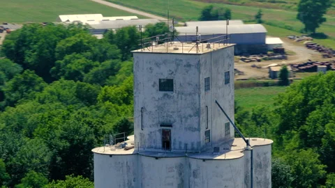 Fly around large silo tower structure midwest kansas Stock Footage 329783039