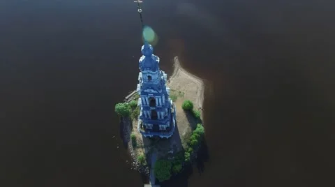 Fly around old belfry in the middle of the river Volga in Kalyazin. Stock Footage 63767213