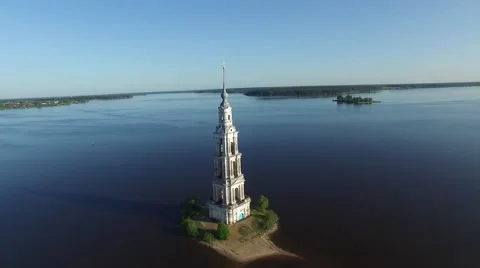 Fly around old steeple sticking out in the middle of the river. Stock Footage 63762901