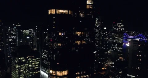 Fly around skyscraper building in night Stock Footage 99081462