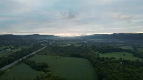 Fly Back and Up from Sunrise Stock Footage 249232020