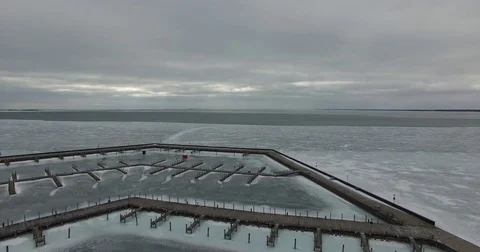 Fly back of frozen pier Stock Footage 72506149