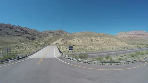 Fly Back from Highway Sign in Virgin River Canyon in Arizona on Highway 15 Stock Footage 84718238