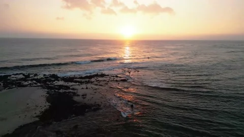 Fly back from sunset to beach Stock Footage 232426456