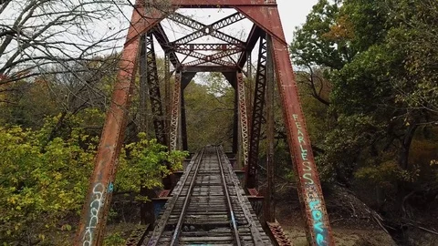 Fly Backwards Through Old Train Bridge Stock Footage 82124561