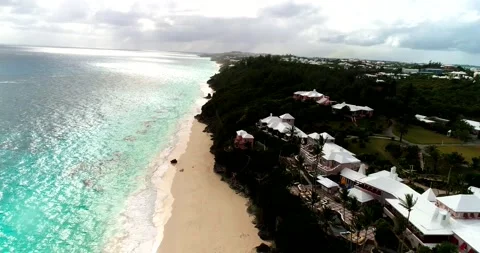 Fly up on beach as a light rain begins to fall. Stock Footage 220589156