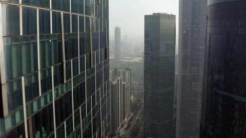 Fly in between office buildings in Central buildings district  (CBD) of Vídeos de archivo 129308795