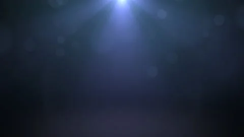 Fly big blue round bokeh with rays on dark background Stock Footage 168662379