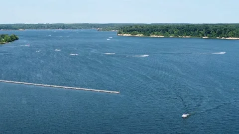 Fly up boats and lake Stock Footage 158865254