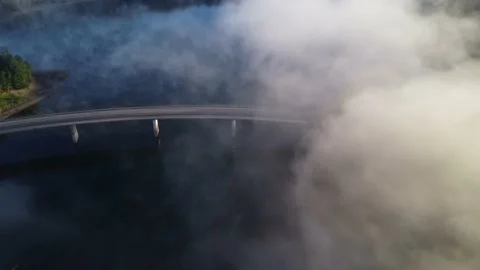 Fly from a Bridge backwards in Fog 스톡 동영상 218309112