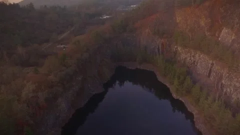 Fly cam over a former open mining place. Taken by drone. Stock Footage 143537518