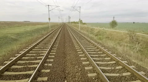 Fly close to railroad tracks Stock Footage 68831413