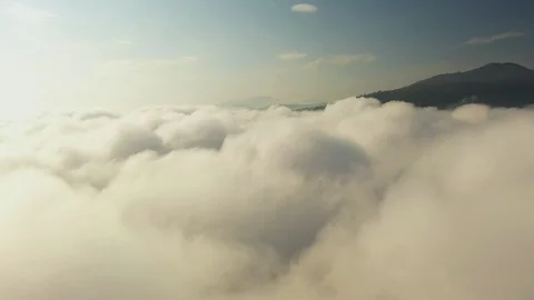 Fly on the clouds with the morning sun Clouds move gently in the sky  Stock Footage 119156573