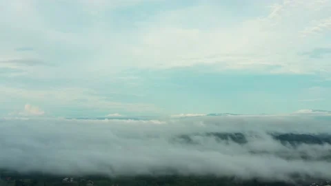 Fly on the clouds with the morning sun Clouds move gently in the sky and sun  Stock Footage 151336495