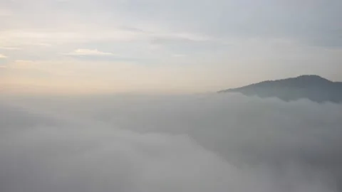 Fly on the clouds with the morning sun Clouds move gently in the sky and sun  Stock Footage 153534753