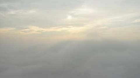 Fly on the clouds with the morning sun Clouds move gently in the sky and sun  Stock Footage 153534790
