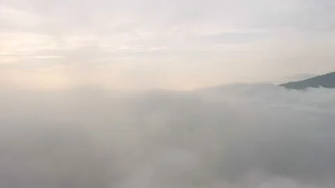 Fly on the clouds with the morning sun Clouds move gently in the sky and sun  Stock Footage 153534941