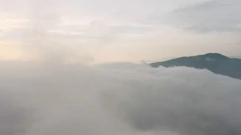 Fly on the clouds with the morning sun Clouds move gently in the sky and sun  Stock Footage 153534951