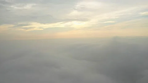 Fly on the clouds with the morning sun Clouds move gently in the sky and sun  Stock Footage 153534994