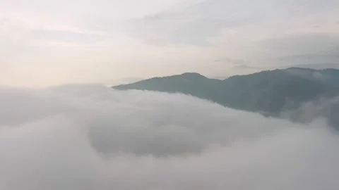 Fly on the clouds with the morning sun Clouds move gently in the sky and sun  Stock Footage 153535015