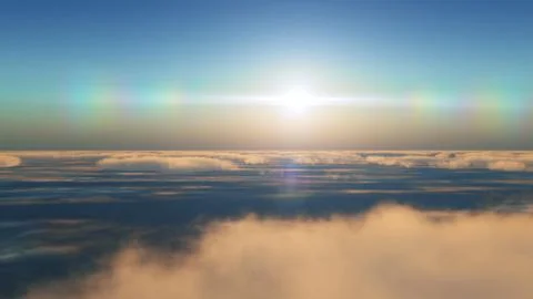 Fly in clouds sunset Stock Photos