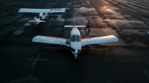FLY DOWN SHOT OF AIRPLANE PREFLIGHT Stock Footage 93402459