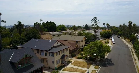 Fly down to suburban house Stock Footage 114031800
