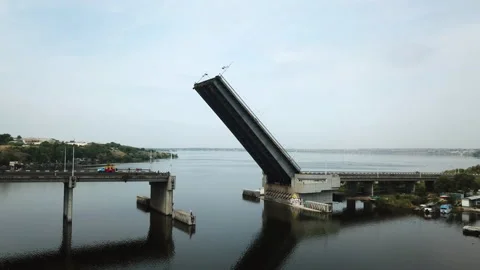 Fly by drone of a raised bridge for the passage of military carables  Stock Footage 196383564