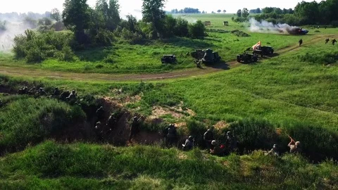 Fly drone Reconstruction World War with attack soldier on destroyed tank smoke. Stock Footage 119727181