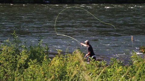 Fly Fisherman Casting (Dolly) Stock Footage