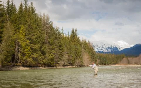A fly fisherman casting on the Kalum River in British Columbia, Canada Stock Photos