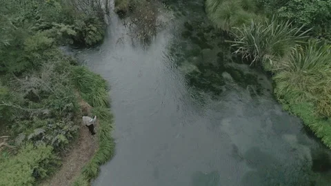 Fly fisherman casting into river drone Stock-Footage 162872201