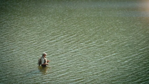 Fly fishing in a river Stock Footage 116048037