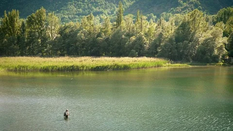 Fly fishing in a river Stock Footage 116048190