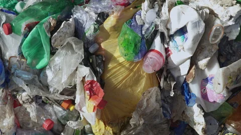 Fly flying over PLASTIC WASTE Stock Footage 263611838