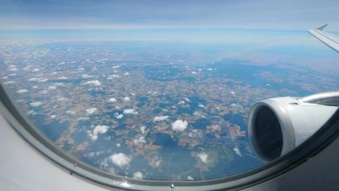 Fly high over agricultural fields at suburbs of Paris, view through window Stock Footage 150398093