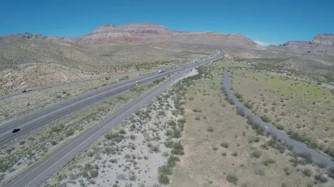 Fly in on Highway and Mesa in Virgin River Canyon Stock Footage 84717140