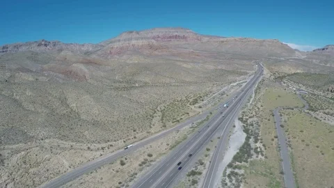 Fly in on Highway and Mesa in Virgin River Canyon Stock Footage 84717608