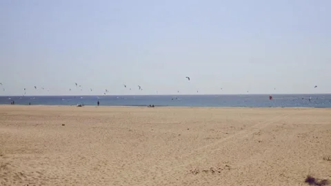 Fly into kitesurfers having fun at Tarifa beach - Spain Video stock 167554278