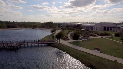 Fly Low Over Lake To Bridge Dock Stock Footage 76381623