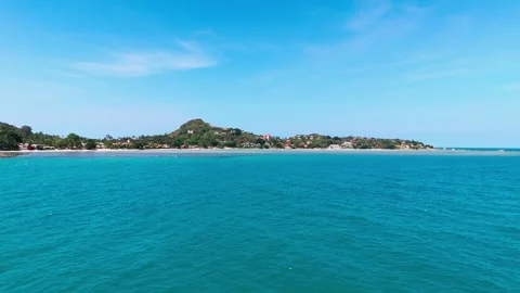 Fly low over sea rising, view of northern Lamai, Koh Samui (1of2) Video stock 334815818