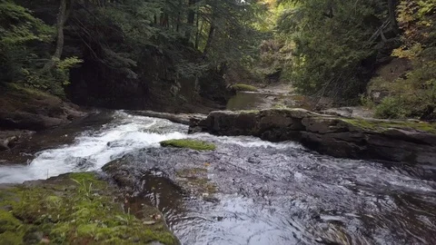 Fly low over waterfall Stock Footage 100127006