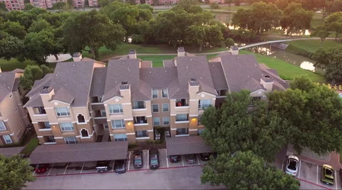 Fly Low Right Over Apartment Complex Stock Footage 65796343
