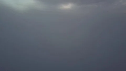 Fly from misty clouds during sunrise. Stock Footage 80006554