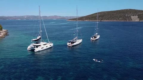Fly out from anchored sailing yachts Video stock 173199418