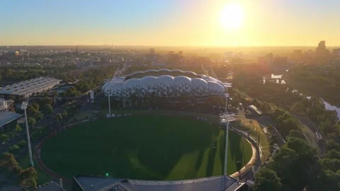 Fly over AAMI Park stadium in Melbourne at sunset 스톡 동영상 325461575