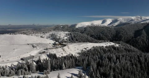 Fly over and around the mountains of Ciucas Romania in January 2022 Sunny day. Stock Footage 170200587