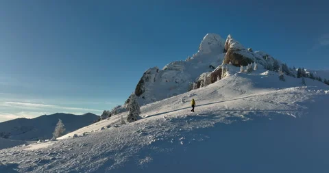 Fly over and around the mountains of Ciucas Romania in January 2022 Sunny day. Stock Footage 170201455