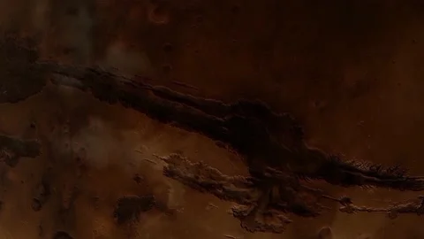 Fly over an area of Mars called Valles Marineris, a geologic feature on Stock Footage 148190194
